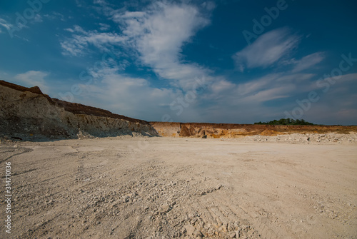 Marl quarry for the extraction of raw materials for the production of cement. Industrial landscape.