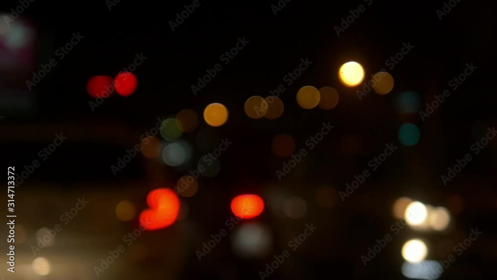Traffic with a lot of car and motorcycle defocused bokeh blurred