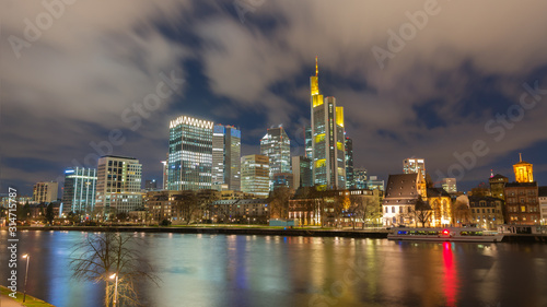 The Skyline of Frankfurt by night  seen from the river Main. 