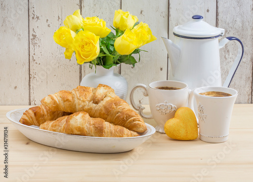 Nostalgic Breakfast With French Croissant photo
