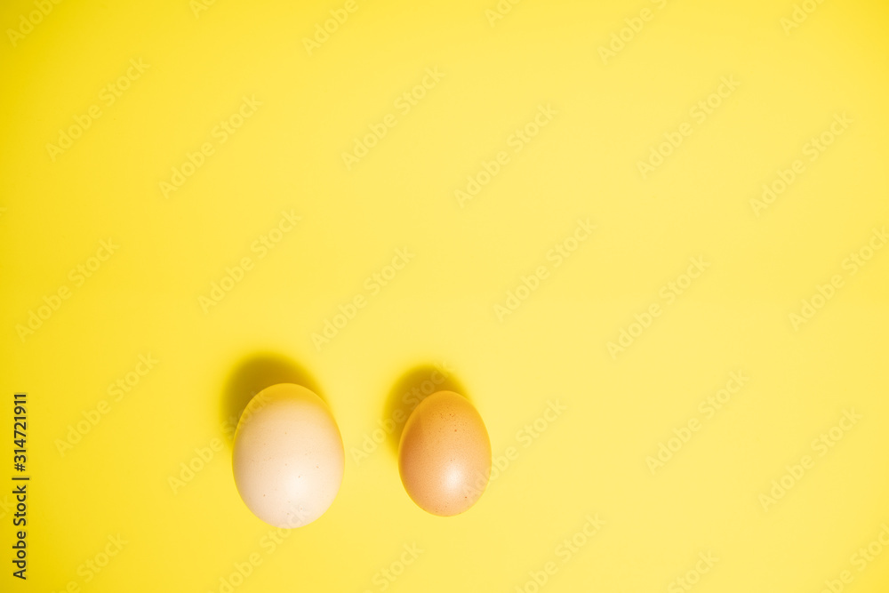 Fresh Easter Eggs on a Yellow Background. Happy Easter