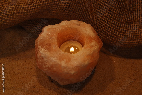 HImalayan Salt Lamp Candle,  lit and glowing