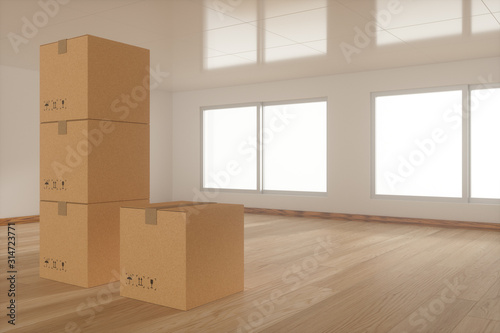 Stacked cardboard in the empty room, with sunlight come from the windows, 3d rendering. © Vink Fan