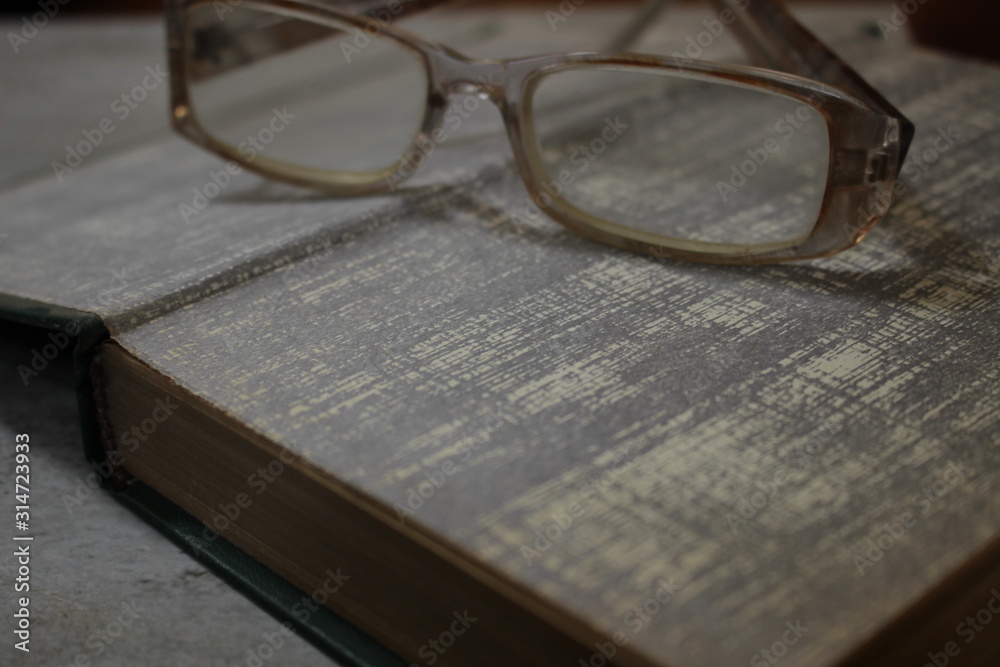 book and glasses