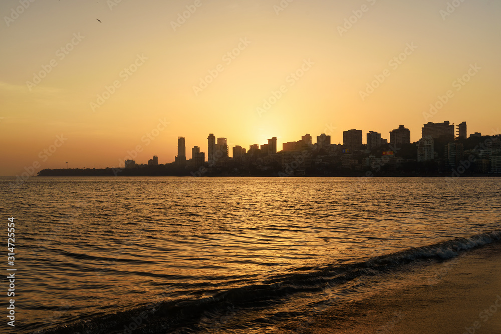 Sunset on Chowpatty beach in Mumbai. India