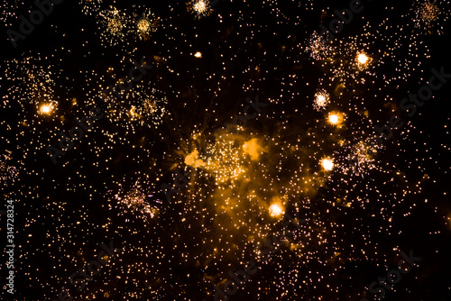 Celebratory colorful fireworks light up the night sky. closeup. New year