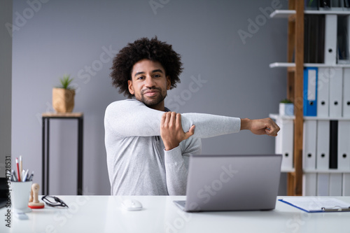 Businessman Stretching His Arms