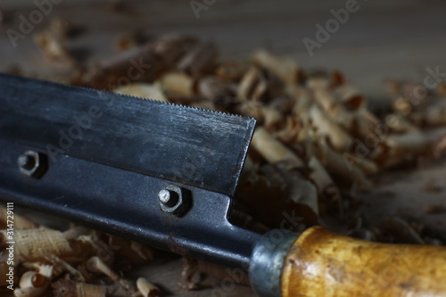 carpenter's tool close-up on a table with shavings