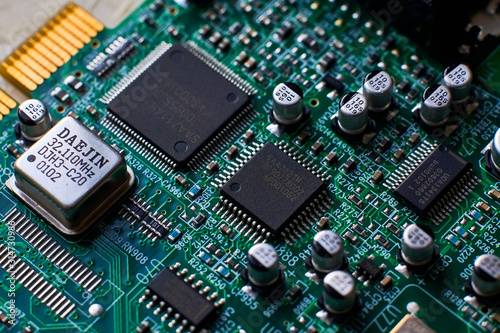 Φωτογραφία printed circuit Board with chips and radio components electronics