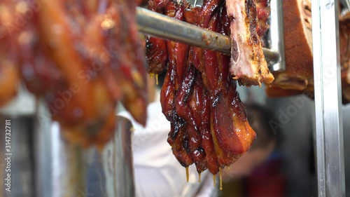 Photography Hong Kong honey glazed barbecue roasted pork hannging in Cantonese restaurant