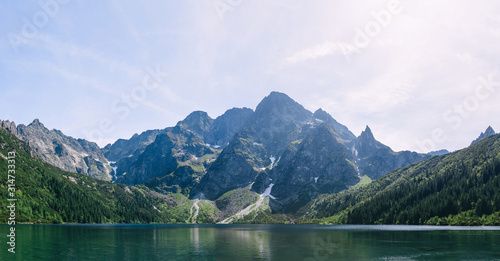 Amazing nature, lake in the mountains, summer landscape with blu