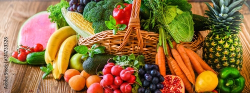 Composition with assorted raw organic fresh vegetables wide banner. Assortment of fruits and vegetable. Healthy raw detox food diet panorama concept.