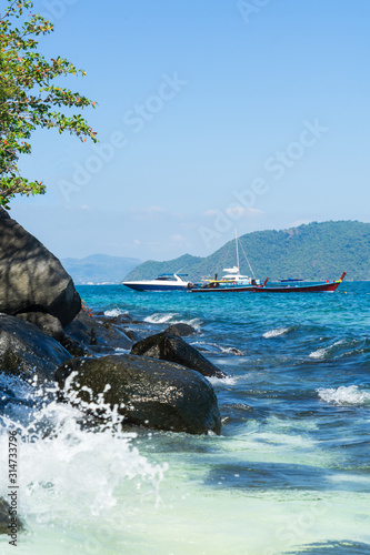 Beautiful seascape. Boats moored offshore in Thailand.