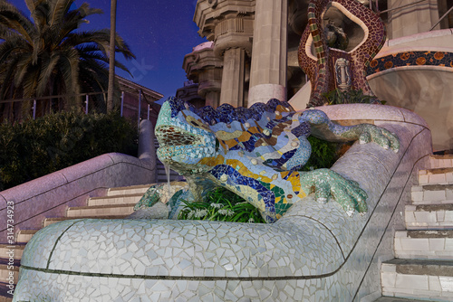 August 17, 2019. Barcelona, Spain. This photo was taken in Park Güell and it shows the famous Dragon's Stairs decorated with the known as "Trencadis" technique often used by Antoní Gaudi.