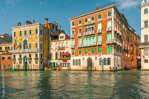 Beautiful view on colorful building facades standing along the Grand canal, Venice, Italy © samael334