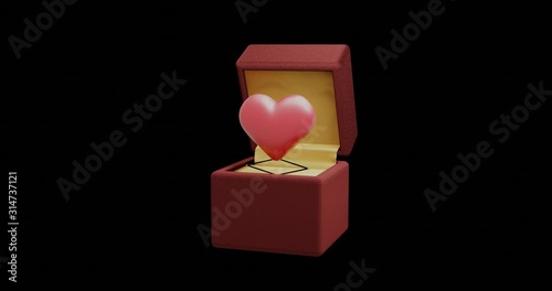 Red heart pops out of a gift velvet box on a spring black background