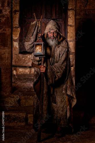 Ragged man, begging for the city streets