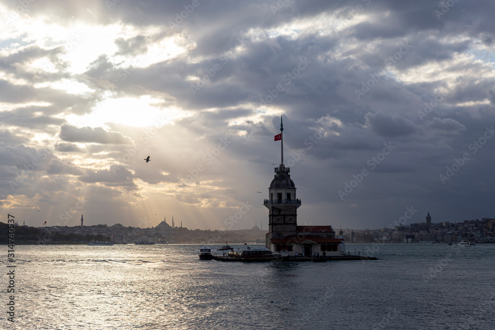 Maiden's Tower, dramatic sky, light soaring through clouds