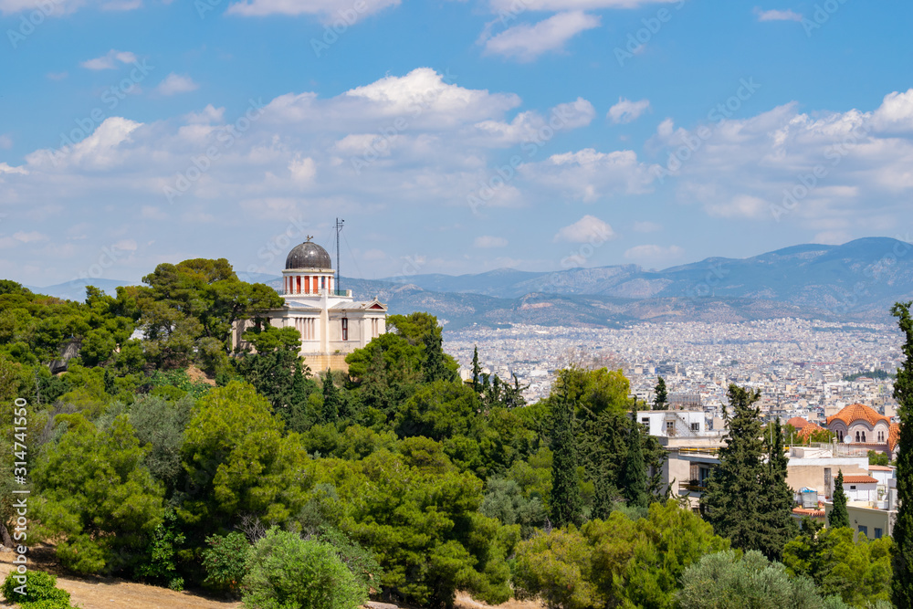 The National Observatory on the hill of Nymphs in Athens as seen from Pnyx, Greece