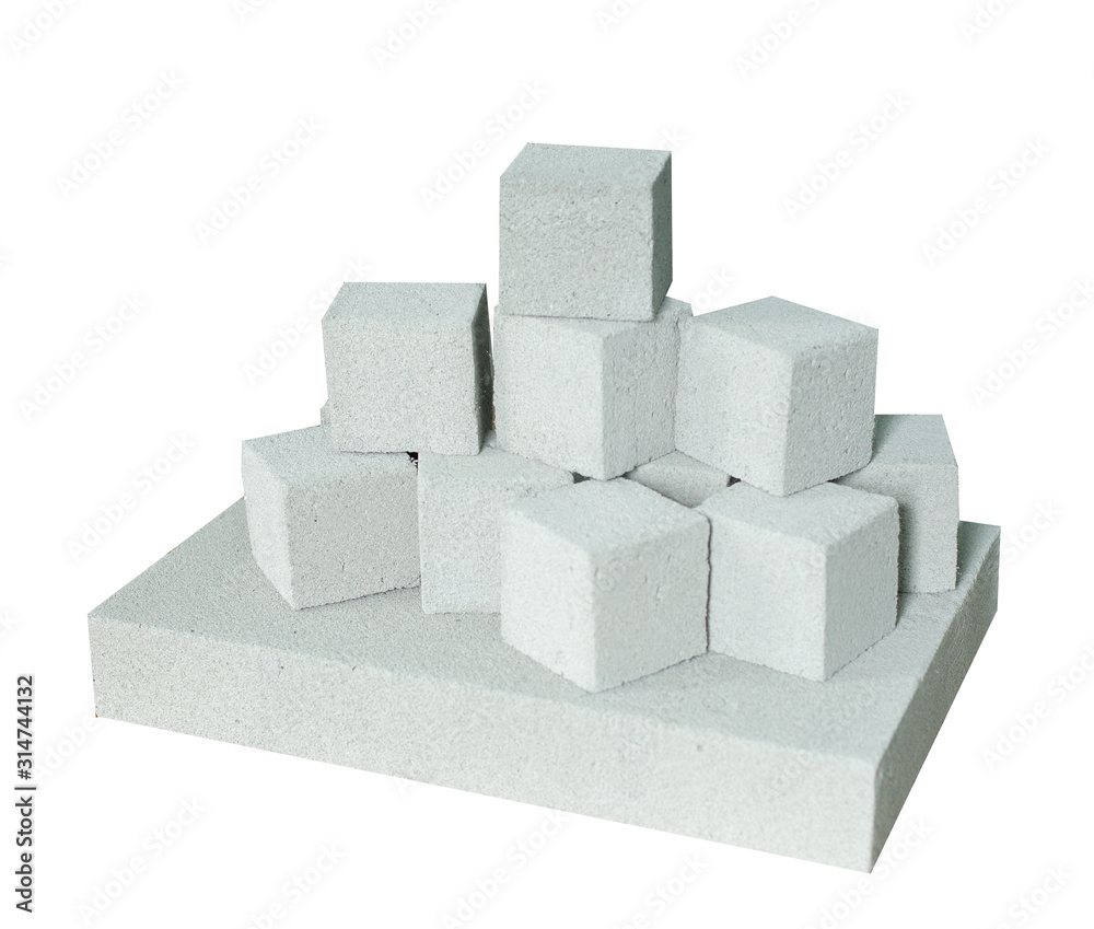 Lightweight construction brick isolated on white. Lightweight foamed gypsum block isolated on white. Lightweight construction brick isolated on white. Lightweight foamed gypsum block isolated on white.