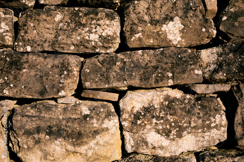 High quality image of old and textured stone wall 