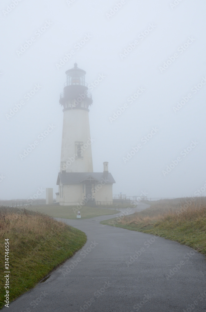 The Yaquina Head lighthouse shrouded in mist
