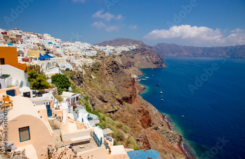 Famous blue dome orthodox church in village of Oia on Santorini island in Greece in Europe. 