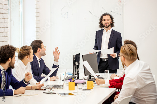 Photos young diverse caucasian people hold business meeting in office, everyone in form