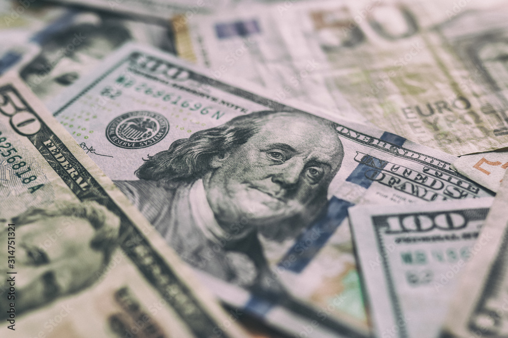 International currencies background. Money from different countries: dollars, euros. euro and dollar banknotes. money background. leading currencies. Selective focus. Close-up. International currencies background. Money from different countries: dollars, euros. euro and dollar banknotes. money background. leading currencies. Selective focus. Close-up.