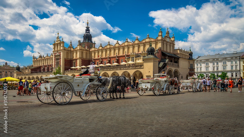 Poland - Horse carriages on the plaza - Krakow