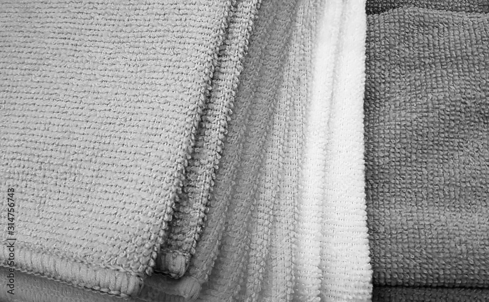 Pile of Multicolored Cloths Black and white style Pile of Multicolored Cloths Black and white style