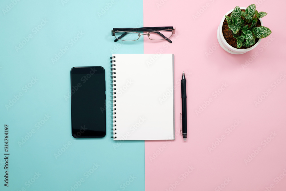 Blank notebook with phone,smart phone,pen on flat desig background. Blank notebook with phone,smart phone,pen on flat desig background.