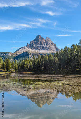 Tre Cime di Lavaredo, aka Drei Zinnen, reflection in water of Antorno Lake Dolomites, Italy. © dannywilde