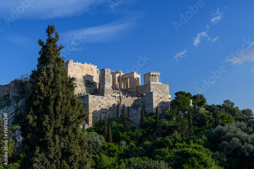 Parthenon Temple in Acropolis of Athens, Greece. Golden hour light.