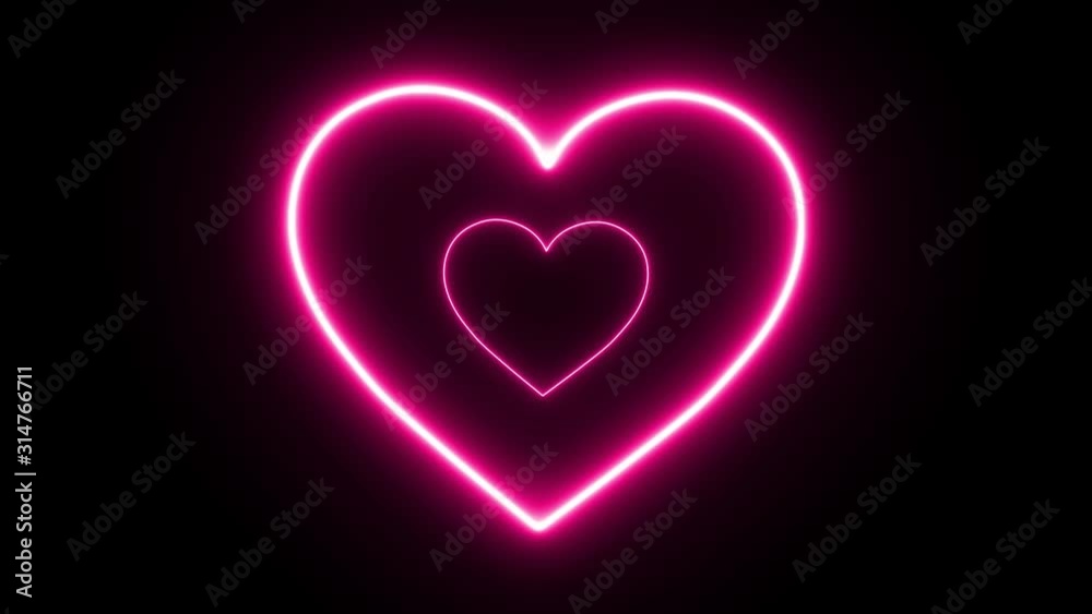 Pink neon heart loop animation on black background