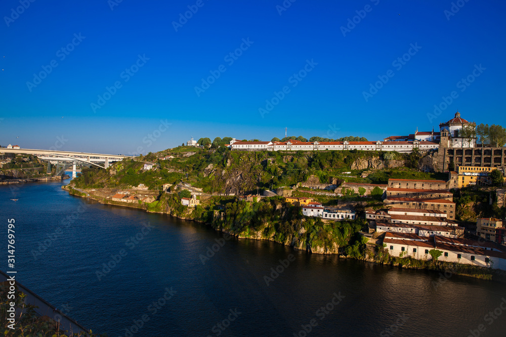 View of the Duoro River in a beautiful early spring day at Porto City in Portugal