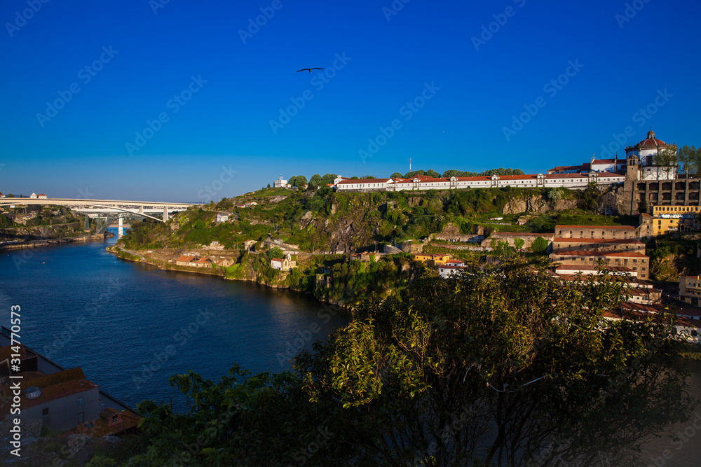 View of the Duoro River in a beautiful early spring day at Porto City in Portugal