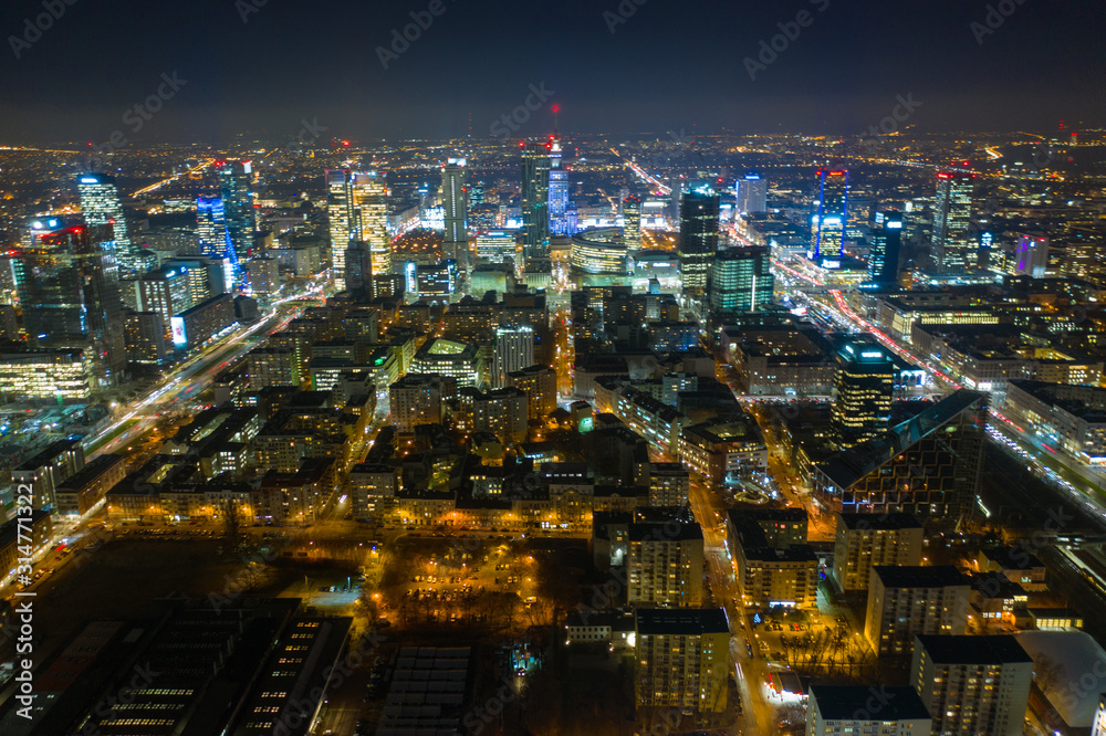 custom made wallpaper toronto digitalWarsaw-Poland 04. December. 2019. Aerial view of luminous high-rise buildings of the business center with lighted windows located in Warsaw against the evening sky. 