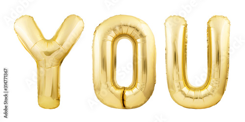 Word YOU made of golden inflatable balloon letters isolated on white background. Helium balloons forming word YOU