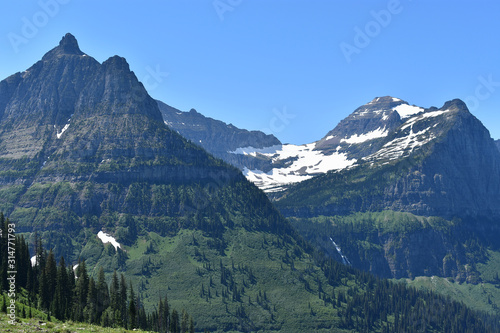 Valley Between Snow Dusted Mountains with Hidden Waterfall, Going-to-the-Sun Road, Glacier National Park, Montana