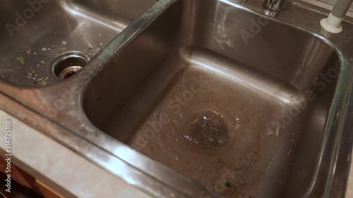 Clogged Garbage Disposal in Kitchen Sink photo