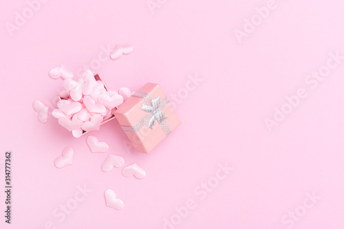 Gift box with hearts on a pink background. Valentine`s day. © Augustas Cetkauskas