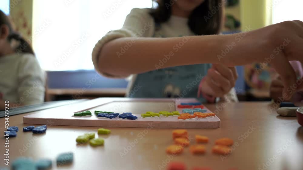 The School Girl Making Mosaic work