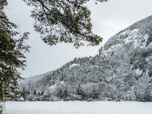 Adirondack Mountain in witner covered in snow photo