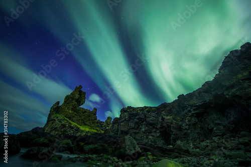 Aurora Borealis (Northern Lights) above londrangar rock formation