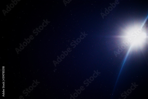 Photography of space, stars from the earth. Black galaxy, moon and moonlight.