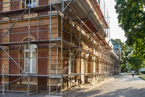 Fotografie, Obraz Construction scaffolding of a building under renovation.