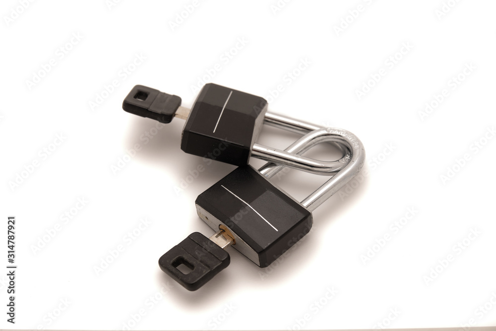 Two padlocks white background isolation - peace of mind Two padlocks white background isolation - peace of mind