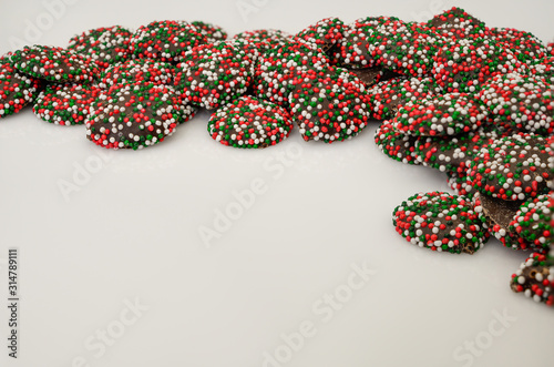 red candy beads on white background