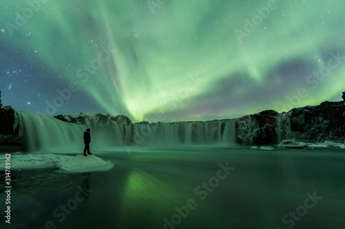 Northern Lights (Aurora Borealis) above Godafoss Waterfall, Iceland